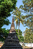 Vientiane, Laos - Wat Si Saket, the area around the temple precinct is filled with stupas, drum tower, open pavilion sheltering Buddha statues. 